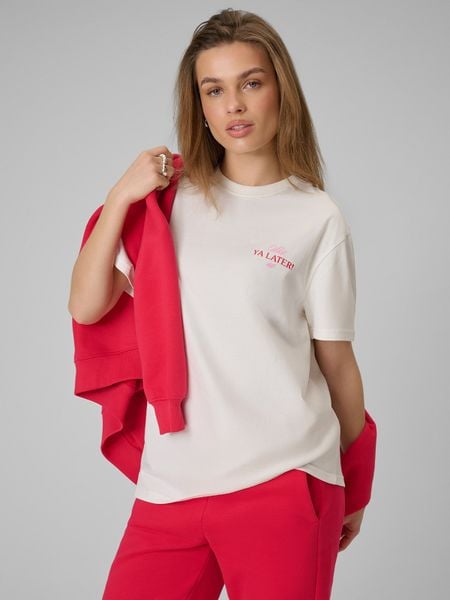 4F T-shirt loose z nadrukiem damski - beżowy L. Brązowe t-shirty damskie 4F, l, bez wzorów, z bawełny, bez kołnierzyka, bez ramiączek. Za 69.99 zł.