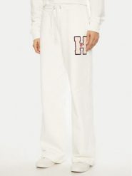 Tommy Jeans Spodnie dresowe H Graphic DW0DW20558 Biały Regular Fit. Białe spodnie dresowe damskie Tommy Jeans, bez wzorów, z bawełny. Za 349.99 zł.