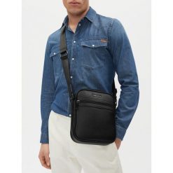 Saszetka GINO ROSSI. Czarne saszetki i nerki męskie Gino Rossi, bez wzorów. Za 159.99 zł.