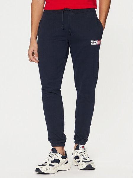 Tommy Jeans Spodnie dresowe Entry DM0DM20277 Granatowy Slim Fit. Niebieskie spodnie sportowe męskie Tommy Jeans, m, bez wzorów, z bawełny. Za 179.99 zł.