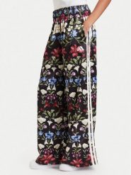 Adidas Spodnie dresowe Adidas X Farm Rio Premium KZ5536 Czarny Loose Fit. Czarne spodnie dresowe damskie Adidas, bez wzorów, z dresówki. Za 599.99 zł.