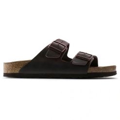 Birkenstock Arizona SFB LEOI Habana Klapki damskie. Brązowe klapki damskie Birkenstock, bez wzorów, z nubiku, klasyczne, z otwartym noskiem, bez obcasa, bez zapięcia. Za 489.99 zł.