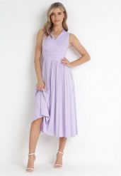 Fioletowa Sukienka Midi Bez Rękawów z Plisowanym Dołem Dreana. Fioletowe sukienki damskie Born2be, na imprezę, l, bez wzorów, eleganckie, bez kołnierzyka, bez ramiączek, midi, plisowane. Za 159.99 zł.