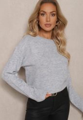 Jasnoniebieski Sweter z Domieszką Wełny Torissia. Niebieskie swetry nierozpinane damskie Renee, na zimę, bez wzorów, z wełny, casualowe, bez kołnierzyka, bez ramiączek. Za 129.99 zł.
