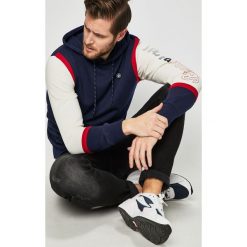Jack & Jones - Bluza. Żółte bluzy męskie Jack & Jones, l, bez wzorów, z bawełny, bez ramiączek, z kapturem. W wyprzedaży za 69.90 zł.