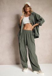 Ciemnozielone Bawełniane Spodnie High Waist o Szerokim Kroju Velili. Zielone spodnie materiałowe damskie Renee, bez wzorów, z bawełny, eleganckie, z podwyższonym stanem. Za 119.99 zł.