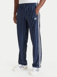 Adidas Spodnie dresowe Firebird Pinstripes Track Pants KR7231 Granatowy Regular Fit. Niebieskie komplety dresowe męskie Adidas, l, bez wzorów, z dresówki. Za 349.99 zł.