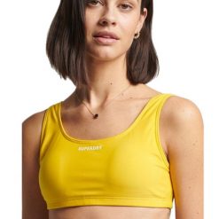 Góra od bikini Superdry Code Essential Top. Żółte bikini Superdry, bez wzorów, z lycry. W wyprzedaży za 136.50 zł.