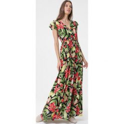 Czarna Sukienka Morrow. Czarne sukienki damskie Born2be, l, bez wzorów, z materiału, bez kołnierzyka, bez ramiączek, maxi, kopertowe. Za 59.99 zł.