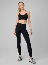 4F Legginsy treningowe bezszwowe damskie - czarne XS/S. Czarne legginsy damskie 4F, l, bez wzorów, ze skóry, z podwyższonym stanem, długie, na fitness i siłownię. Za 119.99 zł.