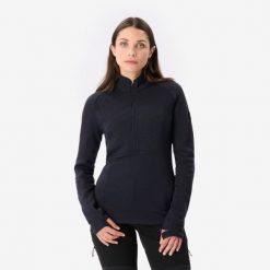 Koszulka damska trekkingowa z długim rękawem Merino Resist. Czarne bluzki damskie SIMOND, m, bez wzorów, z materiału, sportowe, bez kołnierzyka, bez ramiączek. Za 299.99 zł.