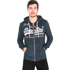 SuperDry Bluza Niebieski. Niebieskie bluzy męskie Superdry, xl, bez wzorów, z bawełny, bez ramiączek, bez kaptura. Za 400.95 zł.