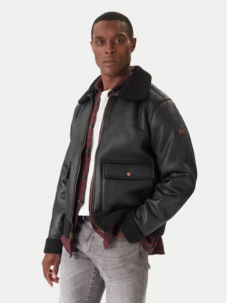 Wrangler Kurtka z imitacji skóry Shearling 112371854 Czarny Regular Fit. Czarne kurtki męskie Wrangler, m, bez wzorów, ze skóry, bez kaptura. Za 389.99 zł.