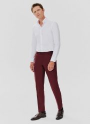 PAKO LORENTE – Spodnie garniturowe w kolorze burgundowym. Czerwone eleganckie spodnie męskie Pako Lorente, m, bez wzorów, z poliesteru, eleganckie. Za 899.99 zł.