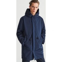 Ocieplana parka z kapturem - Granatowy. Niebieskie parki damskie Reserved, bez wzorów, z kapturem. Za 299.99 zł.