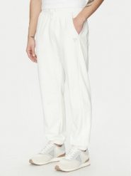 Guess Spodnie dresowe Z5GB06 K6ZS1 Biały Regular Fit. Białe spodnie sportowe męskie Guess, m, z aplikacjami, z bawełny. Za 239.99 zł.