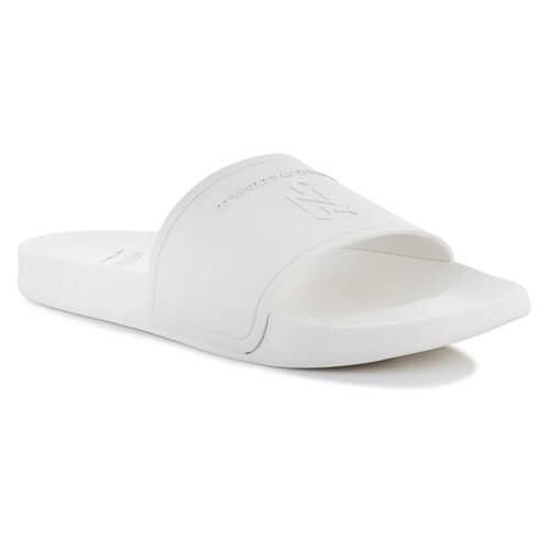 Klapki męskie Puma 38494401. Białe klapki męskie Puma, bez wzorów, z materiału, bez zapięcia. Za 262.00 zł.