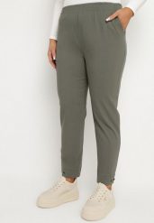 Ciemnozielone Spodnie z Wiskozą z Gumką w Talii i Aplikacjami przy Nogawkach Stellorie. Zielone spodnie materiałowe damskie Born2be, z aplikacjami, z jeansu, eleganckie, plus size. Za 64.99 zł.