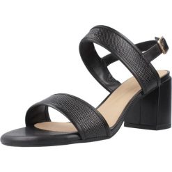 Sandały Clarks Model Ezoria Sling Kolor Czarny. Czarne sandały damskie Clarks, bez wzorów, ze skóry, bez obcasa, na obcasie, bez zapięcia. Za 362.05 zł.