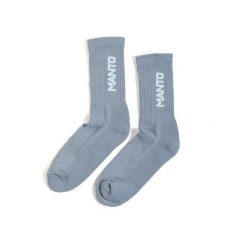 Skarpetki sportowe Manto Logotype 23. Białe skarpety męskie Manto, bez wzorów, z bawełny. Za 47.99 zł.