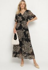 Czarna Sukienka w Kwiaty o Rozkloszowanym Kroju z Wiązaniem Raloiti. Czarne sukienki damskie Born2be, na co dzień, l, bez wzorów, eleganckie, bez kołnierzyka, bez ramiączek, maxi, rozkloszowane. Za 84.99 zł.