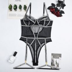 Body z siateczką i błyszczącą nitką na wieczorne wyjścia Semire. Czarne body Intica, bez wzorów, z materiału. Za 139.00 zł.