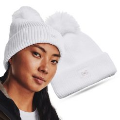 Czapka zimowa damska UNDER ARMOUR 1373098 z pomponem. Białe czapki damskie Under Armour, na zimę, bez wzorów, sportowe. Za 89.99 zł.