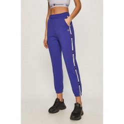 Damskie spodnie dresowe Champion Track Pant fioletowe XS. Fioletowe spodnie dresowe damskie Champion, bez wzorów, z dresówki, sportowe, długie. Za 200.99 zł.