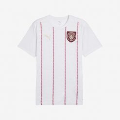Koszulka piłkarska przedmeczowa Puma Manchester City 24/25. Bluzki damskie Puma, xl, bez wzorów, z materiału, sportowe, bez kołnierzyka, bez ramiączek. Za 319.99 zł.