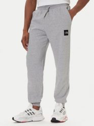 The North Face Spodnie dresowe Fine NF0A8C1K Szary Tapered Fit. Szare spodnie sportowe męskie The North Face, m, bez wzorów, z dresówki. Za 299.99 zł.