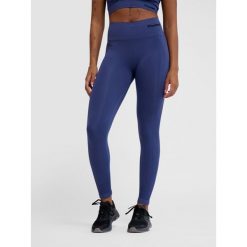 Damskie legginsy bezszwowe z wysoką talią Hummel TIF. Niebieskie legginsy damskie Hummel, bez wzorów, na fitness i siłownię. Za 143.00 zł.