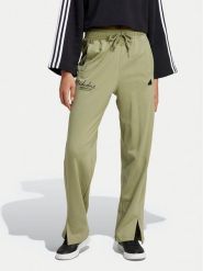 Adidas Spodnie dresowe Signature Graphic JI6524 Zielony Loose Fit. Zielone spodnie dresowe damskie Adidas, bez wzorów, z bawełny. Za 169.99 zł.