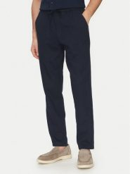 Guess Spodnie materiałowe F5GB02 WH4J0 Granatowy Regular Fit. Niebieskie spodnie materiałowe męskie Guess, z aplikacjami, z bawełny. Za 299.99 zł.