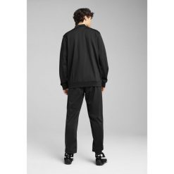 Męski dres inspirowany koszykówką z poliestru PUMA Black. Brązowe komplety dresowe męskie Puma, m, bez wzorów, z dresówki. W wyprzedaży za 174.00 zł.