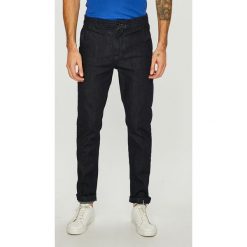 G-Star Raw - Jeansy Bronson Tuxedo. Niebieskie jeansy męskie G-Star Raw, z bawełny, retro. W wyprzedaży za 269.90 zł.