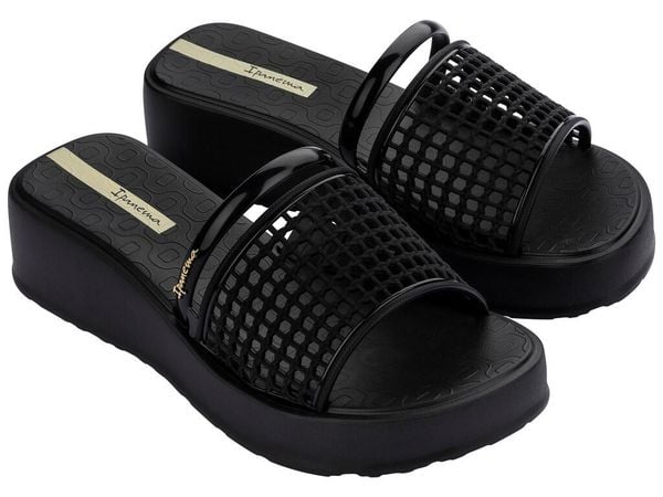 Klapki damskie Ipanema Essence. Czarne klapki damskie Ipanema, bez wzorów, z gumy, bez obcasa, bez zapięcia. Za 139.00 zł.