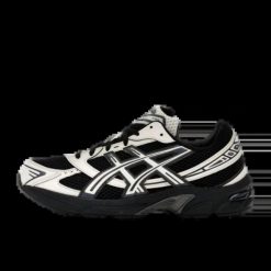Damskie tenisówki Asics. Czarne trampki i tenisówki damskie Asics, bez wzorów, z materiału, bez zapięcia. Za 493.15 zł.