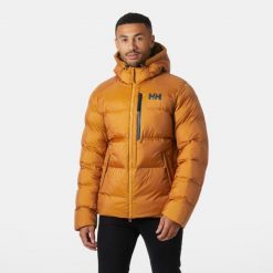 Kurtka z kapturem Helly Hansen Active Winter. Brązowe kurtki męskie Helly Hansen, bez wzorów, z puchu, sportowe, z kapturem. W wyprzedaży za 1,157.50 zł.