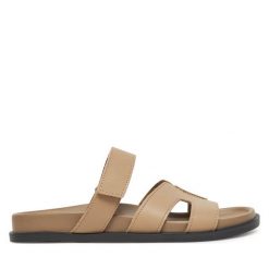 Klapki Gino Rossi. Brązowe klapki damskie Gino Rossi, bez wzorów, bez obcasa, bez zapięcia. Za 249.99 zł.