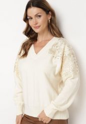 Jasnobeżowy Sweter w Stylu Nietoperza z Cyrkoniami i Cekinami Nevalithia. Brązowe swetry nierozpinane damskie Born2be, bez wzorów, wizytowe, bez kołnierzyka, bez ramiączek. Za 129.99 zł.