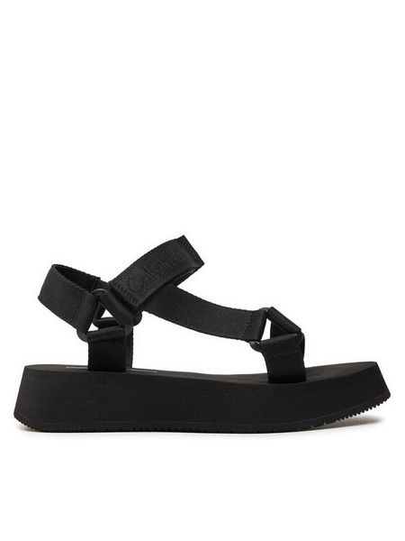 Calvin Klein Jeans Sandały Sandal Velcro Webbing In Mtl YW0YW01480 Czarny. Czarne sandały damskie Calvin Klein Jeans, bez wzorów, z jeansu, bez obcasa, na płaskiej podeszwie, bez zapięcia. Za 319.99 zł.