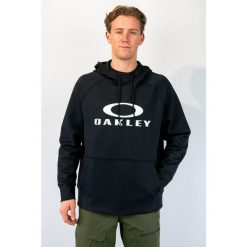 Męski sweter na co dzień Oakley. Czarne swetry męskie Oakley, l, bez wzorów, z materiału, bez kołnierzyka, bez ramiączek. Za 480.99 zł.