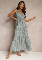 Jasnoniebieska Rozkloszowana Sukienka w Kwiaty na Ramiączkach Malaisia. Niebieskie sukienki damskie Renee, na spacer, na lato, l, bez wzorów, eleganckie, bez kołnierzyka, bez ramiączek, maxi, rozkloszowane. Za 74.99 zł.