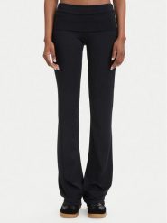 Guess Legginsy V6YB24 K4713 Czarny Slim Fit. Czarne legginsy damskie Guess, z aplikacjami, z syntetyku. Za 264.99 zł.