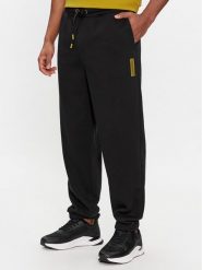 Calvin Klein Spodnie dresowe Grid Logo K10K112430 Czarny Relaxed Fit. Czarne spodnie sportowe męskie Calvin Klein, m, bez wzorów, z bawełny. Za 319.99 zł.