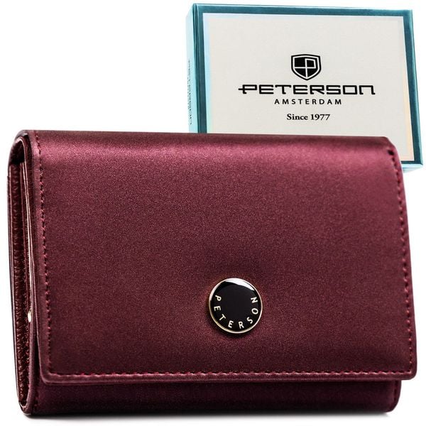 Skórzany portfel damski zamykany na zatrzask, odszyty ze skóry naturalnej i ekologicznej w fioletowym kolorze PTN PS445-HNL Peterson. Fioletowe portfele damskie Peterson, ze skóry. Za 119.99 zł.
