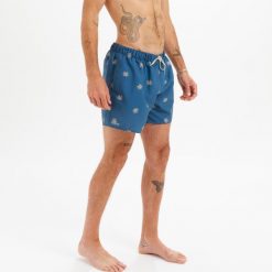 Spodenki surfingowe męskie Olaian 100 Cycas 15". Niebieskie szorty męskie OLAIAN, bez wzorów, z materiału, sportowe. Za 49.99 zł.