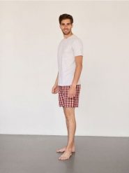 Dwuczęściowa piżama z bawełny - jasnoszary. Szare piżamy męskie Reserved, l, bez wzorów, z bawełny, bez kołnierzyka, bez ramiączek. W wyprzedaży za 55.99 zł.