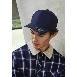 Czapka Flexfit delta Adjustable. Niebieskie czapki damskie FLEXFIT, bez wzorów. Za 167.50 zł.