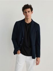 Marynarka slim fit - niebieski. Niebieskie garnitury męskie Reserved, l, bez wzorów, z dzianiny. W wyprzedaży za 119.99 zł.